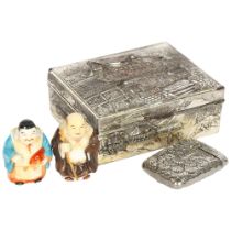 An Oriental antimony box with embossed decoration, floral white metal embossed Vesta, and a pair