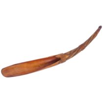 An Ethiopian carved horn spoon, length 35cm