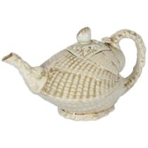 A 19th century Staffordshire teapot in the form of a conch shell, H16.5cm Good overall condition, no