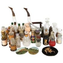 A porcelain jointed doll, scent bottles, miniature ornaments etc