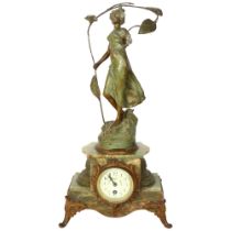 An 8-day striking stepped onyx mantel clock, floral decorated dial surmounted by a patinated spelter