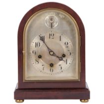 An Edwardian dome-top mantel clock with silvered chapter ring, 8-day gong striking movement,