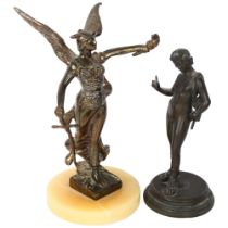 A cast-bronze statue of a Grecian Warrior Goddess, winged with torch and sword, on an onyx base,