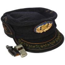 An Officer's hat and cap, a Thunderer whistle, and a Vintage turned wood whistle