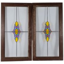 A pair of coloured leadlight framed window panels, 45cm x 84cm overall, rebate size approx 33cm x