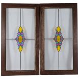 A pair of coloured leadlight framed window panels, 45cm x 84cm overall, rebate size approx 33cm x