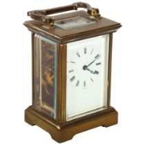 An English brass-cased 8-day carriage clock, enamel dial and Roman numerals, height not including