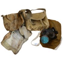 A World War II dated gas mask bag, bag reads "Maple 1941", again with associated gas mask, and a