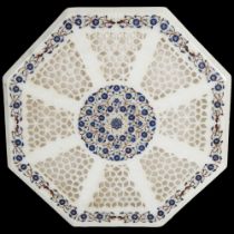 An Indian alabaster octagonal table top, with pierced panels and inlaid lapis and hardstone floral