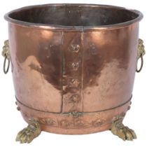 A Victorian studded coal bucket, with lion mask brass ring handles and paw feet, diameter 37cm,