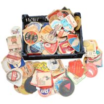 A tray full of Vintage advertising beer mats