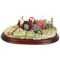 A Country Artists sculpture of a man and Terriers with tractor "first cut", by Keith Sherwin, 375/
