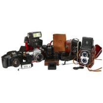 A quantity of Vintage cameras and equipment, including an Olympus OM101 Power Focus, a Praktica