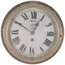 A brass-cased ship's bulkhead clock, overall diameter 24cm