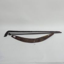 A 1930s Australian carved wood boomerang, plus 2 hardwood African walking sticks, 1 with a Native