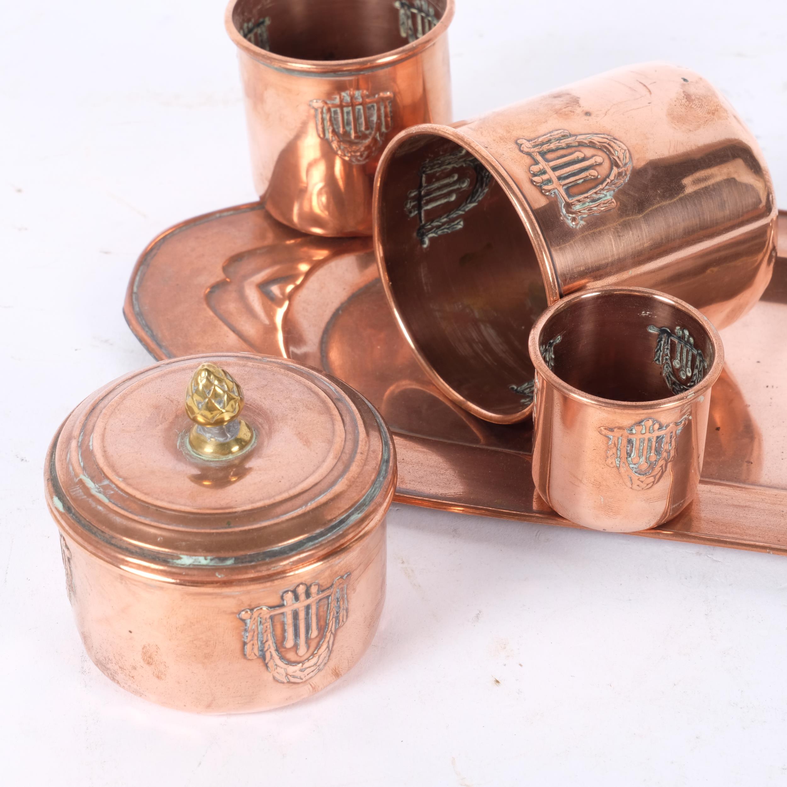 A French Art Nouveau copper tray of rectangular form, a graduated set of 3 matching beakers, and a - Image 2 of 2