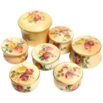 A group of miniature Royal Worcester floral decorated pill pots and covers, tallest 3cm Generally