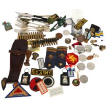 A basket containing various military and other associated items