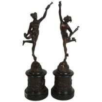 A pair of patinated bronze figures, depicting Hermes and Aphrodite, on turned marble embossed bases,
