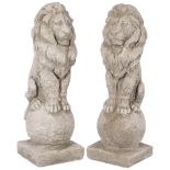 A pair of concrete seated lions, on ball finials and square bases, H46cm