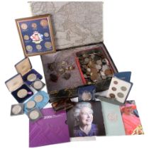 A collection of English and worldwide pre-decimal coins, including commemorative cased items, a