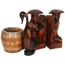 A pair of bookends, Filipino carvings of a man and woman, H28cm, an Filipino Kamagon wooden duck