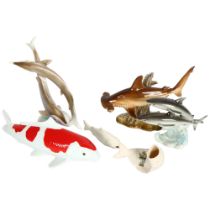 A group of English and Continental porcelain figures, all sculptures are fish related, including a