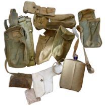 A crate containing various World War II dated items, including various webbing, military bags,