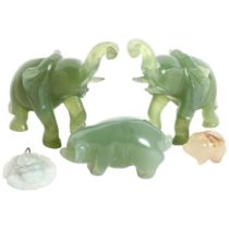 A pair of carved jade elephants, 2 pigs, largest length 7cm, and a Buddha pendant