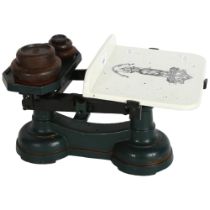 A set of Victorian scales and weights, inscribed Justitia Virtutum Regina, limestone plate