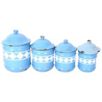 A graduated set of Vintage French enamel kitchen canisters, largest height 18cm 4 in total, the
