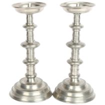 A pair of pewter pricket candlesticks with touch marks, 31cm