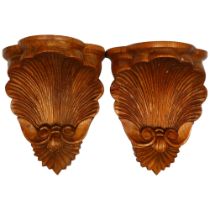 A pair of carved pine wall brackets, H30cm