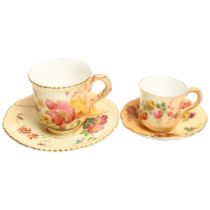 A Royal Worcester Blush Ivory miniature cup and saucer, decorated with sprays and flowers, and a