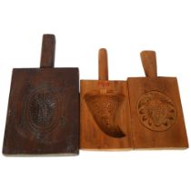 A group of 3 late 19th/early 20th century Japanese wooden rice moulds, the moulds are reversible and