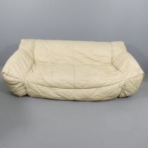 ROCHE BOBOIS - a 1980s Informel sofa designed by Hans Kopfer, in cream leather, with fold-out bed