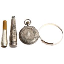 A group of silver items, including a baby's christening bangle, an engraved silver cased fob