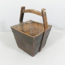 A Chinese elm well bucket. 49x64x43cm.