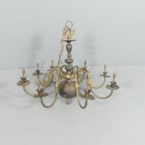 An antique Dutch brass candelabra, converted to electric. Diameter 85cm, height 70cm.