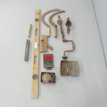 Various vintage tools including sickles, a Marples spirit level, hand drills, a set of Nubo double