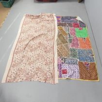 A patchwork wall hanging, 194x44cm, and an embroidered shawl, 223x105cm. (2)
