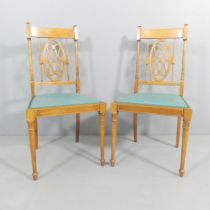 A pair of Victorian side chairs with in line inlaid satinwood.