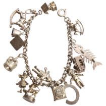 A silver charm bracelet and charms