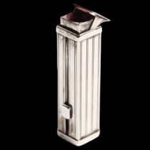 A novelty silver-cased mechanical lipstick holder, with sliding mechanism