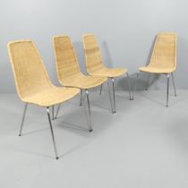 A set of four mid-century design wicker chairs with tubular steel base.