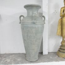 A large terracotta garden urn, with four handles. 50x102cm.