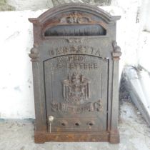 An early 20th century Italian cast iron post box, marked Regie Poste and bearing the royal Italian