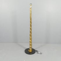 A contemporary gold painted standard lamp of spiral form, on granite base. H - 150cm.