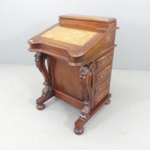 A reproduction mahogany Davenport. 56x74x56cm.