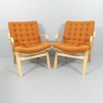 A pair of mid-century Scandinavian Finn Ostergaard Albert lounge chairs in bent ply, for Kvist